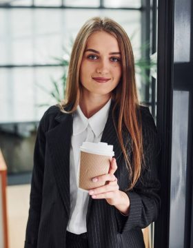 woman-in-formal-clothes-standing-indoors-in-the-of-RL3HSGC.jpg woman-in-formal-clothes-standing-indoors-in-the-of-RL3HSGC.jpg